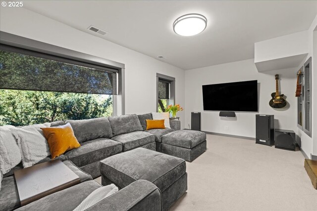 living area with carpet flooring and baseboards