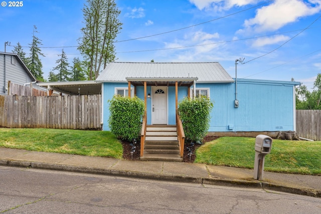 1305 E Van Buren Ave, Cottage Grove, OR 97424 - view of front of property with metal roof and an attached carport