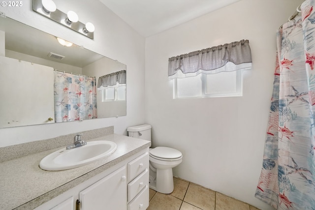 1305 E Van Buren Ave, Cottage Grove, OR 97424 - bathroom with vanity, tile patterned flooring, toilet, and a shower with curtain