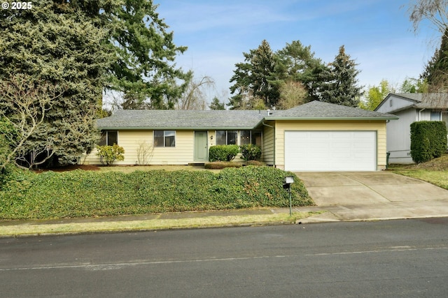 ranch-style house featuring a garage