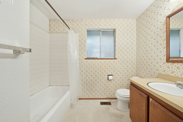 full bathroom featuring vanity, toilet, and shower / bath combo with shower curtain