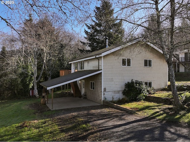 view of home's exterior featuring a patio