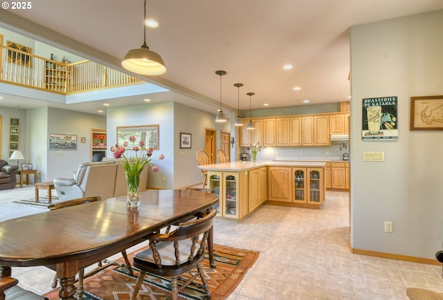 dining area with recessed lighting, baseboards, and light tile patterned floors