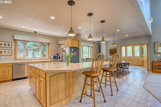 54693 Bingham Rd, Adams, OR 97810 - kitchen featuring stainless steel appliances, healthy amount of natural light, recessed lighting, a kitchen island, and light countertops