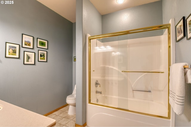 full bathroom with tile patterned flooring, baseboards, vanity, toilet, and enclosed tub / shower combo