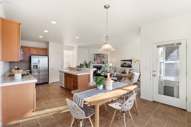 dining space with recessed lighting