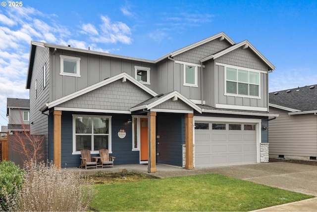 craftsman-style house featuring a garage and a porch