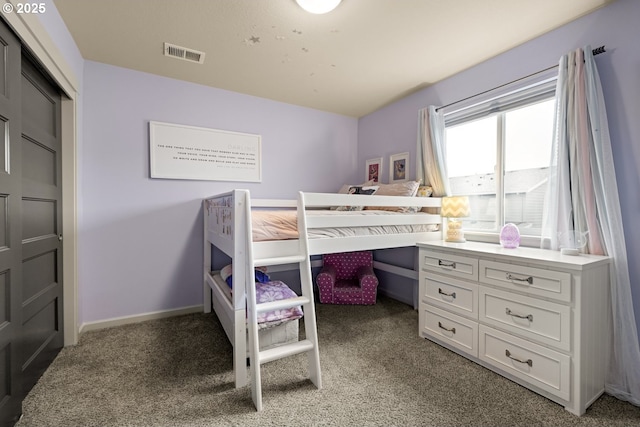 bedroom with light carpet, baseboards, and visible vents