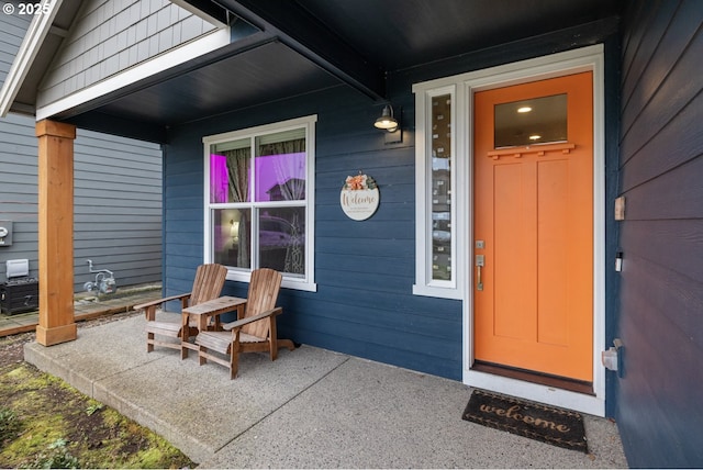 doorway to property with covered porch