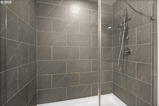 35505 Upper Loop Rd, Pacific City, OR 97135 - full bathroom featuring a tile shower