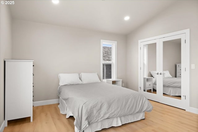 35505 Upper Loop Rd, Pacific City, OR 97135 - bedroom featuring baseboards, wood finished floors, recessed lighting, and lofted ceiling