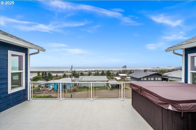 35505 Upper Loop Rd, Pacific City, OR 97135 - view of patio / terrace featuring a hot tub, a water view, and a balcony