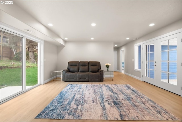 35505 Upper Loop Rd, Pacific City, OR 97135 - sitting room with recessed lighting, healthy amount of natural light, wood finished floors, french doors, and baseboards