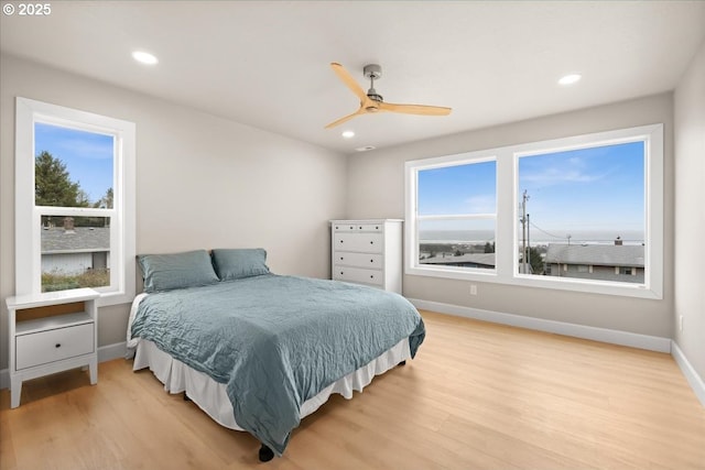 35505 Upper Loop Rd, Pacific City, OR 97135 - bedroom featuring light wood-type flooring, baseboards, recessed lighting, and ceiling fan