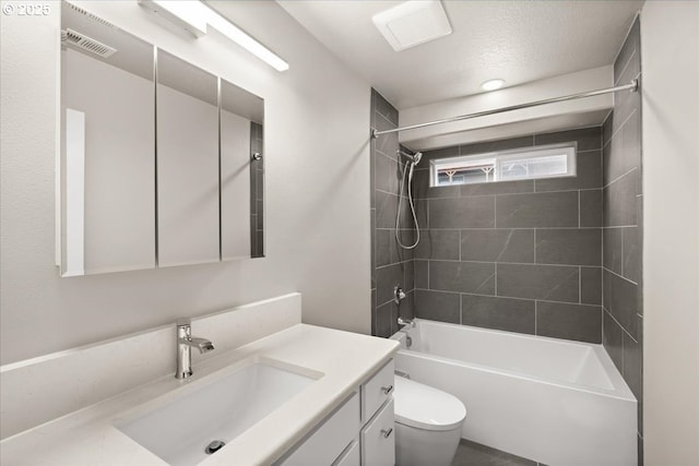 35505 Upper Loop Rd, Pacific City, OR 97135 - full bathroom with vanity, toilet, and shower / bathtub combination