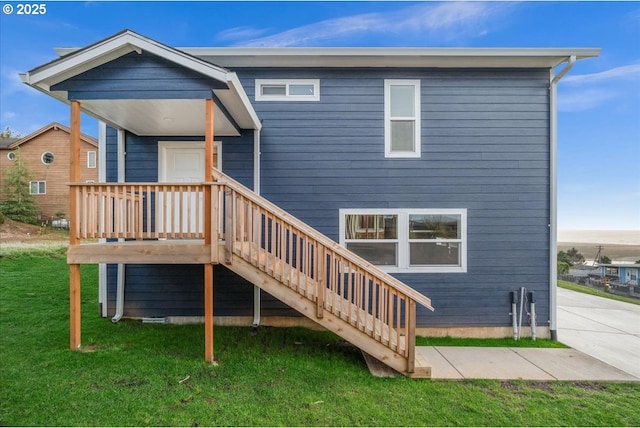 35505 Upper Loop Rd, Pacific City, OR 97135 - back of house featuring a lawn