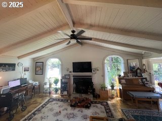 53742 Rosa Rd, Bandon, OR 97411 - living room with a fireplace, wood ceiling, ceiling fan, and an office area