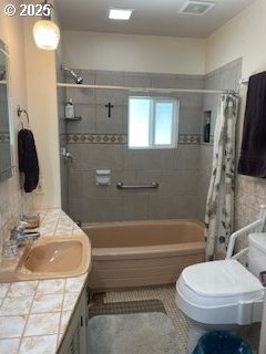 53742 Rosa Rd, Bandon, OR 97411 - full bath featuring shower / bathtub combination with curtain, toilet, vanity, and tile patterned floors
