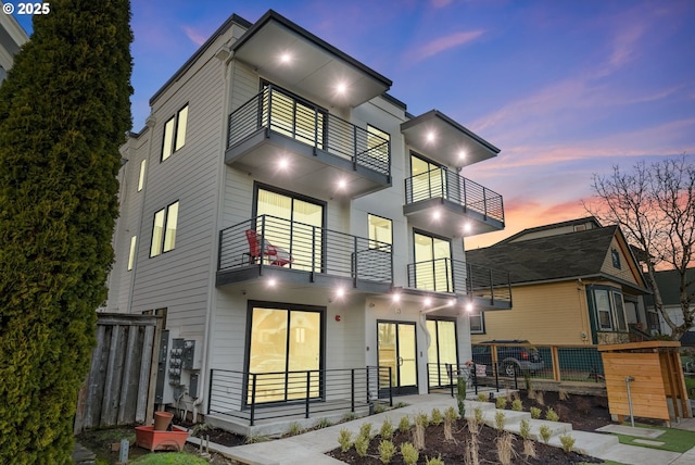 contemporary home featuring a balcony