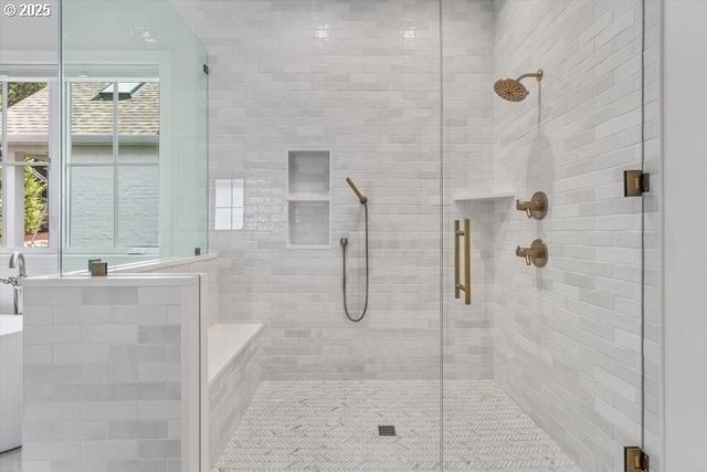full bathroom featuring a shower stall