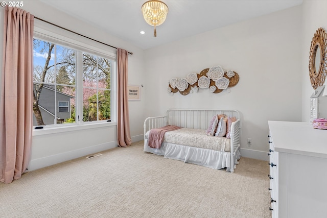 bedroom with carpet, a chandelier, baseboards, and recessed lighting