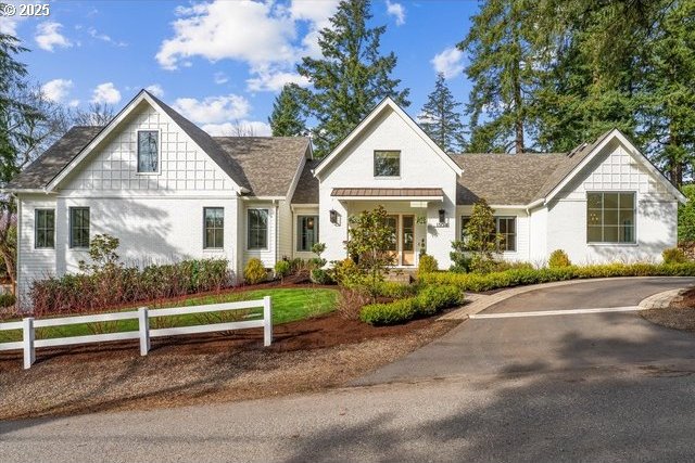 view of front of home with fence
