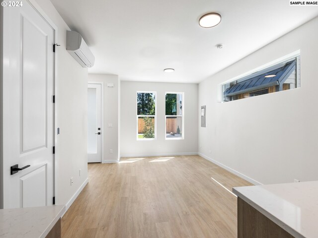 66 NE Stanton St, Portland, OR 97212 - interior space with an AC wall unit and light hardwood / wood-style flooring