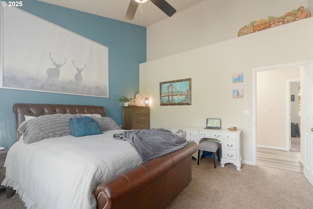 1281 Alderdale Dr, Junction City, OR 97448 - bedroom featuring carpet, baseboards, and a ceiling fan
