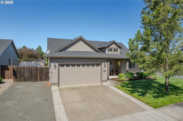 1281 Alderdale Dr, Junction City, OR 97448 - traditional home with concrete driveway, an attached garage, and a shingled roof