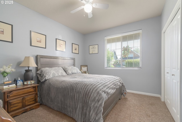 1281 Alderdale Dr, Junction City, OR 97448 - bedroom with a closet, carpet floors, baseboards, and ceiling fan
