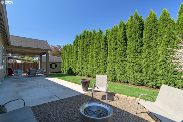 1281 Alderdale Dr, Junction City, OR 97448 - view of patio featuring an outdoor fire pit