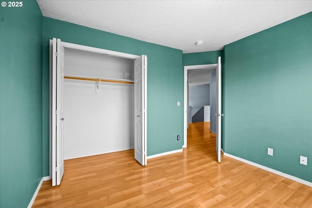 5836 NE Farnham St, Hillsboro, OR 97124 - unfurnished bedroom featuring light wood-type flooring and baseboards