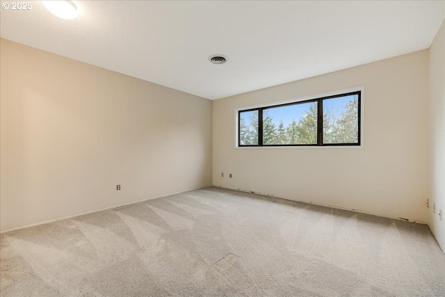 empty room featuring carpet floors