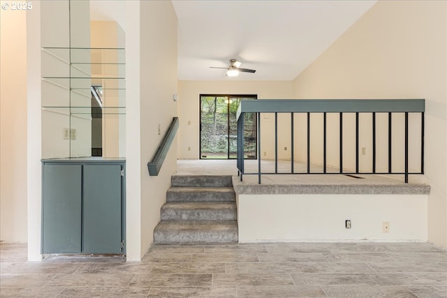 stairs with ceiling fan