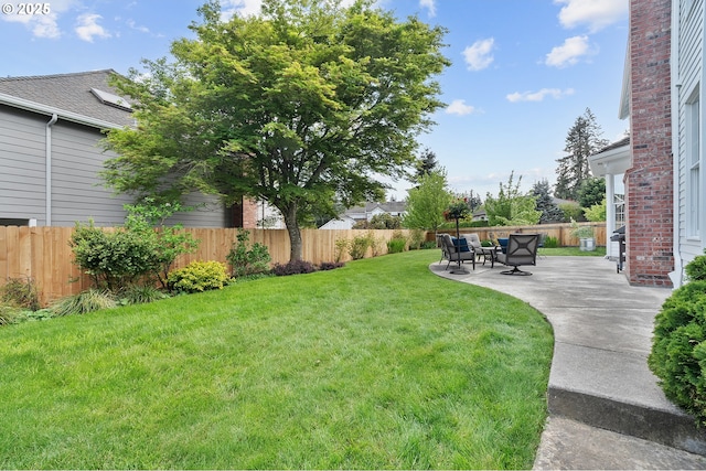 view of yard with a fenced backyard and a patio