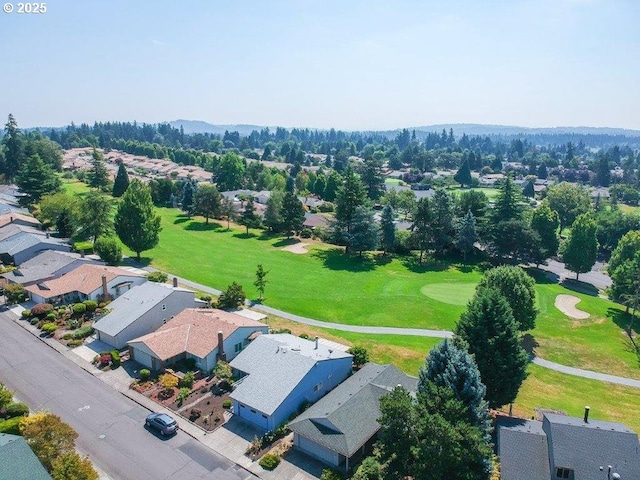 bird's eye view featuring view of golf course and a residential view