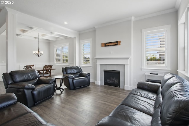29169 NW King St, North Plains, OR 97133 - living area with an inviting chandelier, ornamental molding, coffered ceiling, and wood finished floors