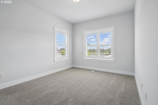 29169 NW King St, North Plains, OR 97133 - carpeted empty room with baseboards and visible vents