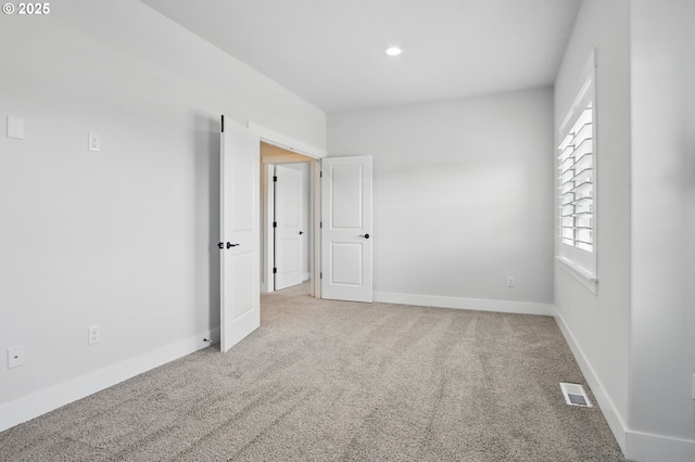 29169 NW King St, North Plains, OR 97133 - carpeted spare room with visible vents, recessed lighting, and baseboards