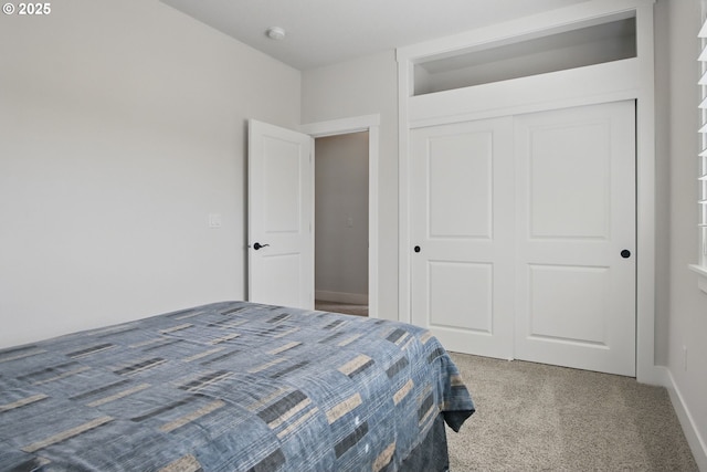 29169 NW King St, North Plains, OR 97133 - bedroom with a closet, baseboards, and carpet flooring