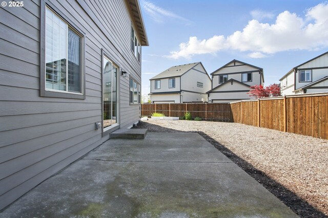 29169 NW King St, North Plains, OR 97133 - view of patio / terrace with a residential view and a fenced backyard