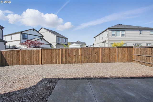 29169 NW King St, North Plains, OR 97133 - view of yard with a fenced backyard, a patio area, and a residential view