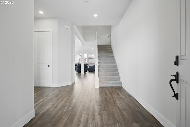 29169 NW King St, North Plains, OR 97133 - foyer featuring baseboards, recessed lighting, dark wood-type flooring, and stairway