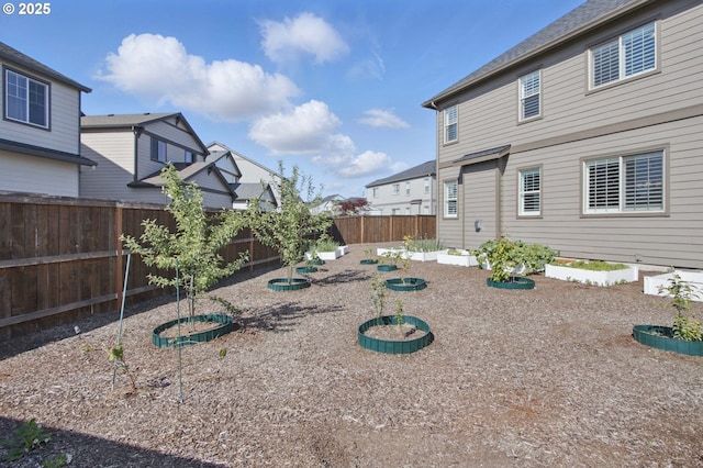 29169 NW King St, North Plains, OR 97133 - view of yard with a fenced backyard and a vegetable garden