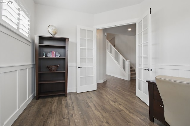 29169 NW King St, North Plains, OR 97133 - interior space with dark wood-type flooring, wainscoting, french doors, and stairway