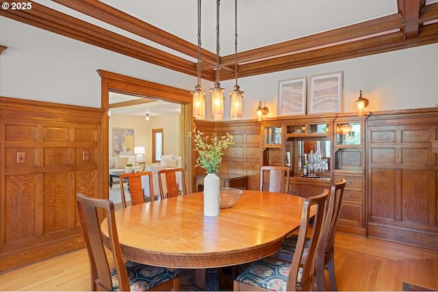 1314 SE 55th Ave, Portland, OR 97215 - dining space featuring light wood-style flooring and beam ceiling