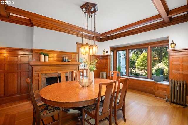 1314 SE 55th Ave, Portland, OR 97215 - dining area featuring radiator heating unit, light wood-type flooring, and beamed ceiling