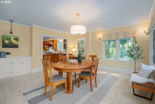 1314 SE 55th Ave, Portland, OR 97215 - dining space with crown molding, baseboards, and light tile patterned floors