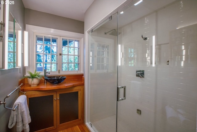 1314 SE 55th Ave, Portland, OR 97215 - bathroom with healthy amount of natural light, a stall shower, and vanity