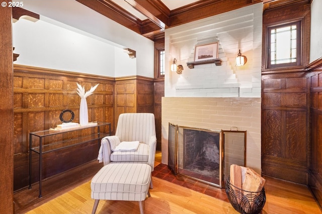 1314 SE 55th Ave, Portland, OR 97215 - sitting room with wood finished floors, coffered ceiling, beam ceiling, a wainscoted wall, and wooden walls